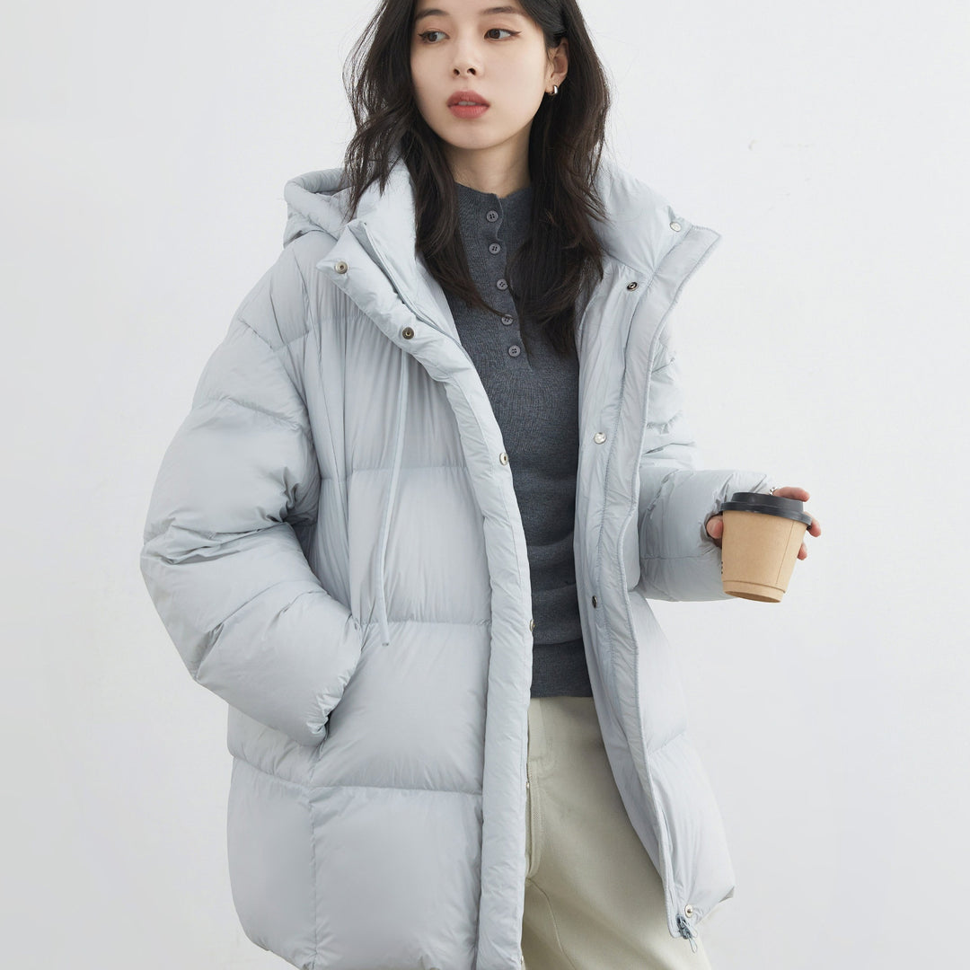 Light blue puffer coat with hood, front buttons and side pockets