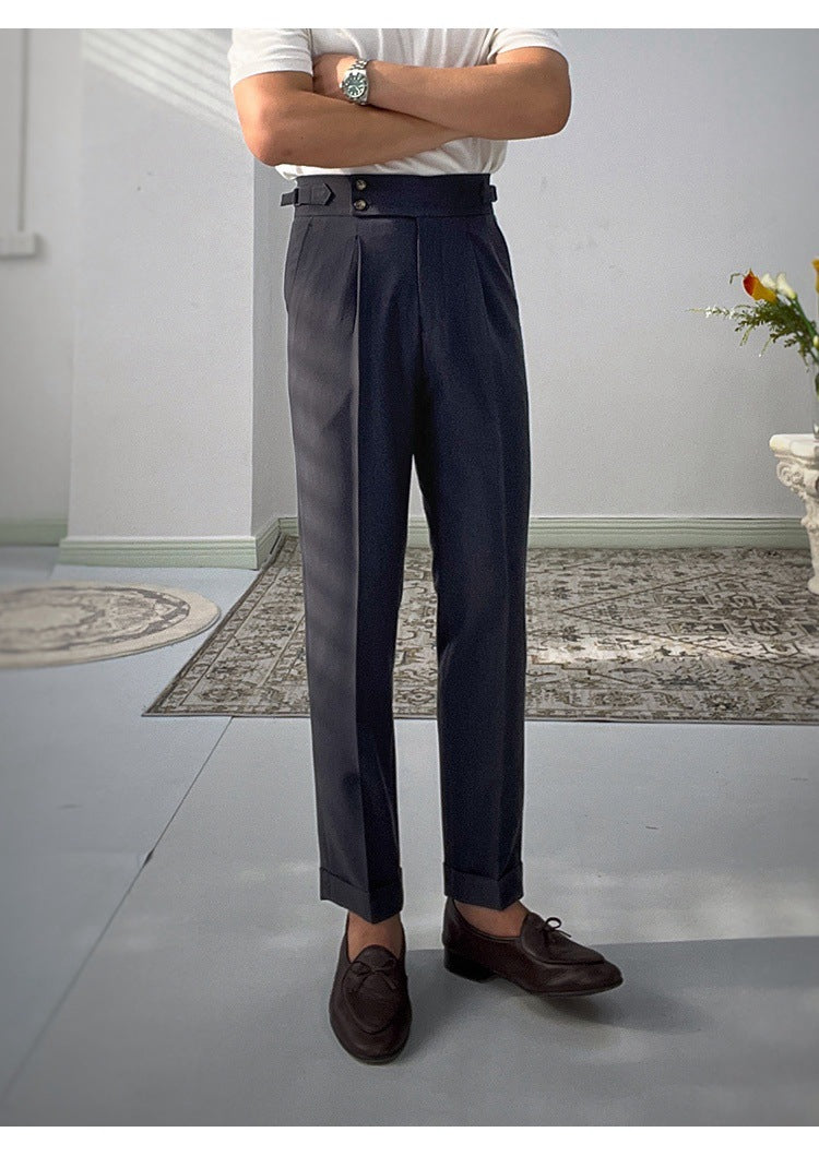 Navy high-waisted straight-leg casual pants with belt loops and button closure