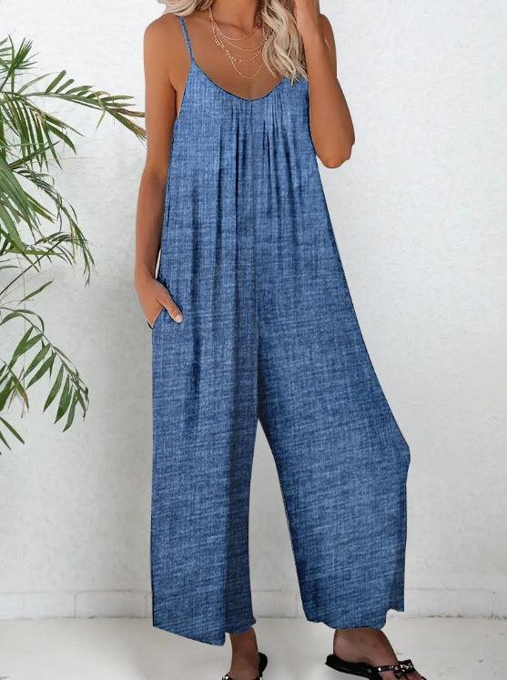 Blue sleeveless V-neck jumpsuit with spaghetti straps and wide-leg pants