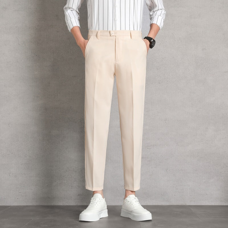 Men’s high-waisted straight trousers in light beige with button closure and belt loops