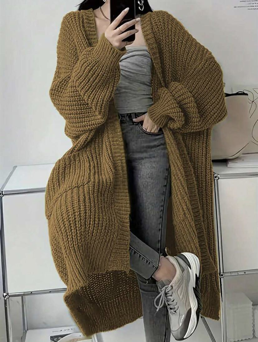 Women’s loose thick knit coat, khaki brown, long sleeves and open front.
