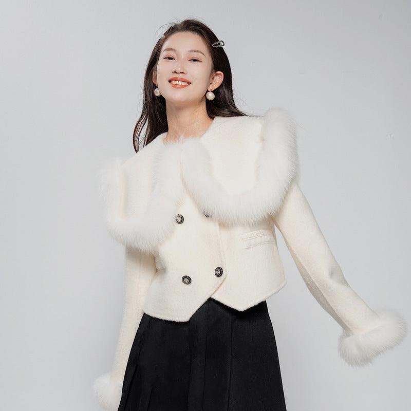 Cream short high-waist wool coat with fox-fur lapels, double-breasted buttons