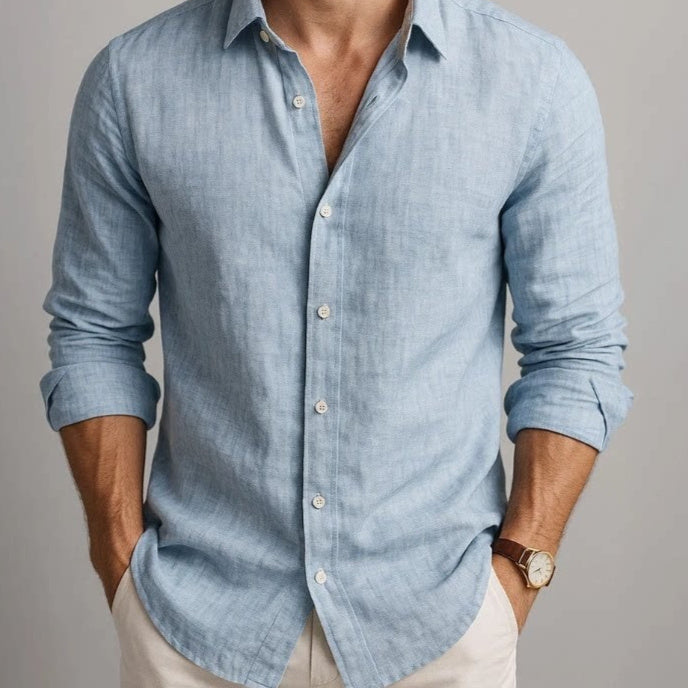 Men's solid blue long-sleeve casual button-up shirt with front button placket