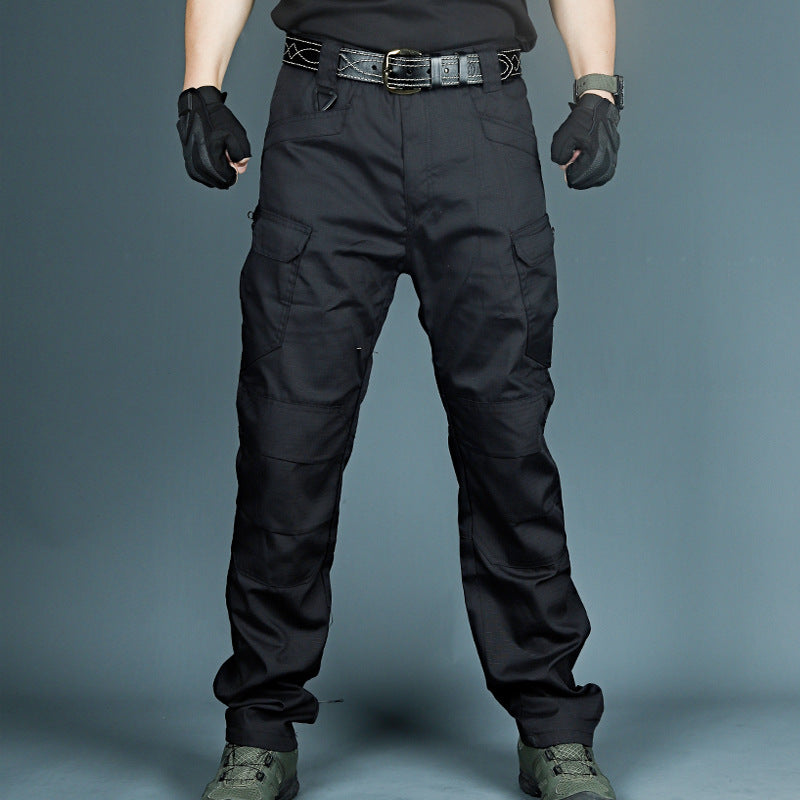 Black tactical cargo pants with belt loops and thigh cargo pocket panels