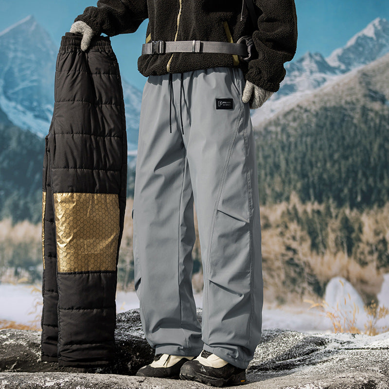 Light gray insulated work pants with drawstring waist, cargo pockets, and cuffed hems