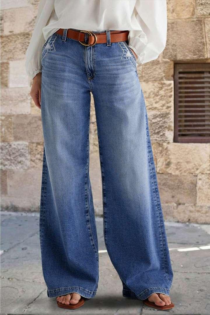 Blue denim straight pants with elastic waistband, belt loops, and wide straight legs.