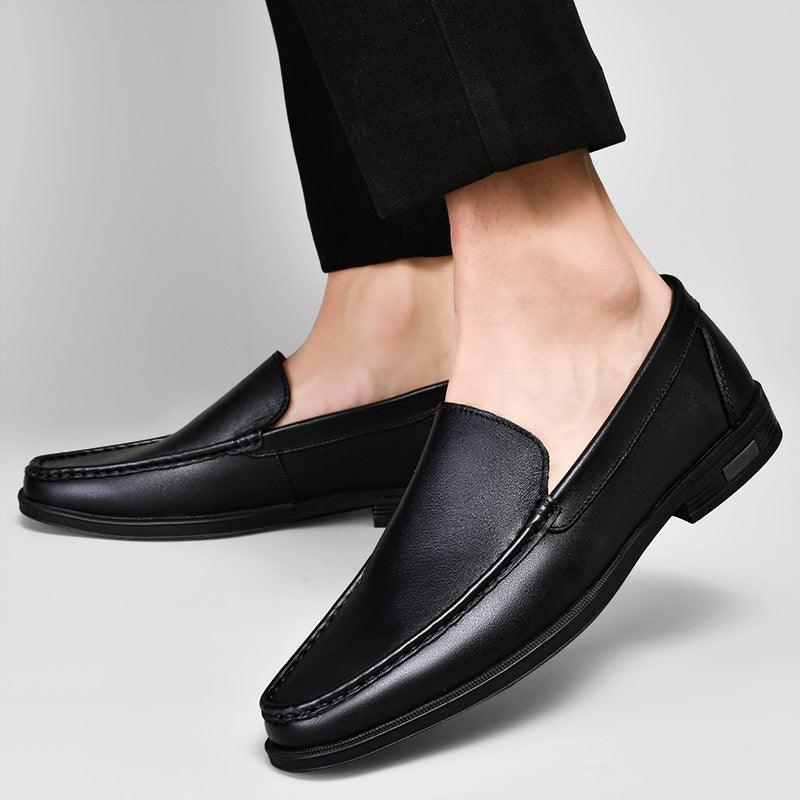 Black leather loafer with moc stitching and low rubber sole