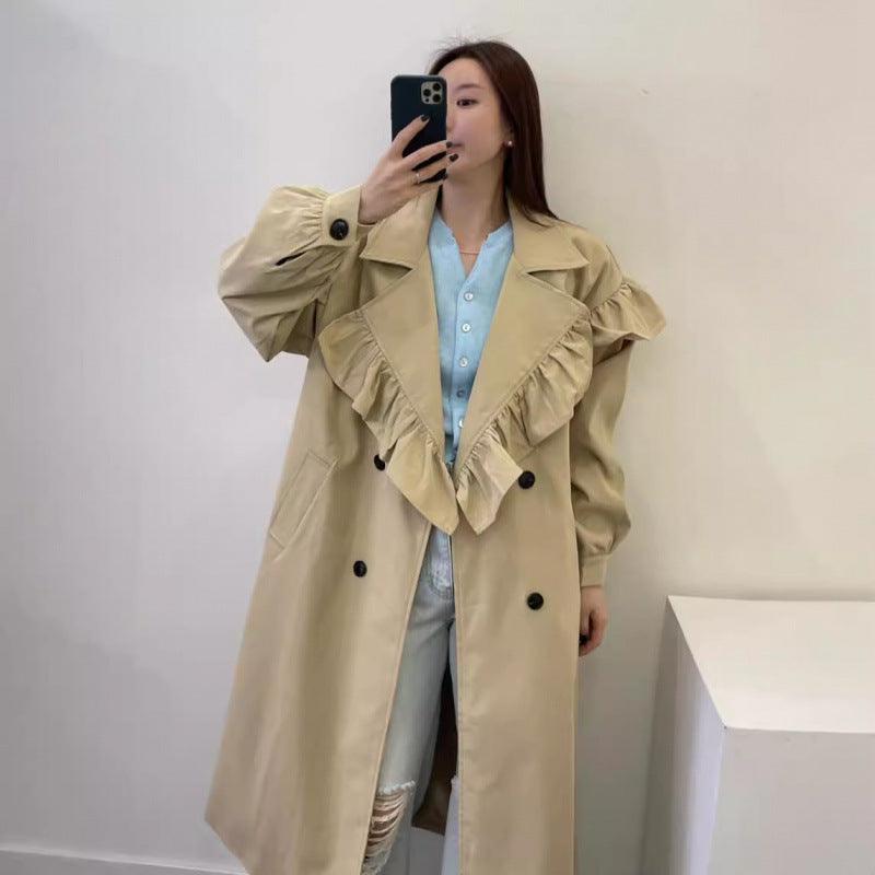 Khaki long trench coat with ruffled shoulder panels and double-breasted button front