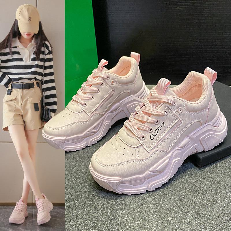 Light pink lace-up chunky sneakers with thick sole and padded collar