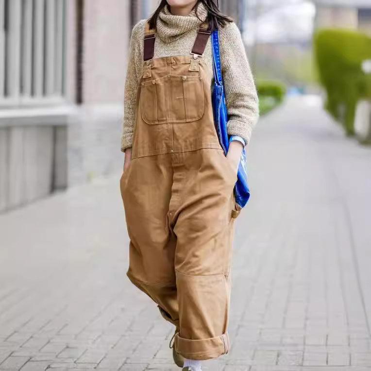 Women’s high-waist work overalls in tan brown with front bib, pockets, and adjustable straps