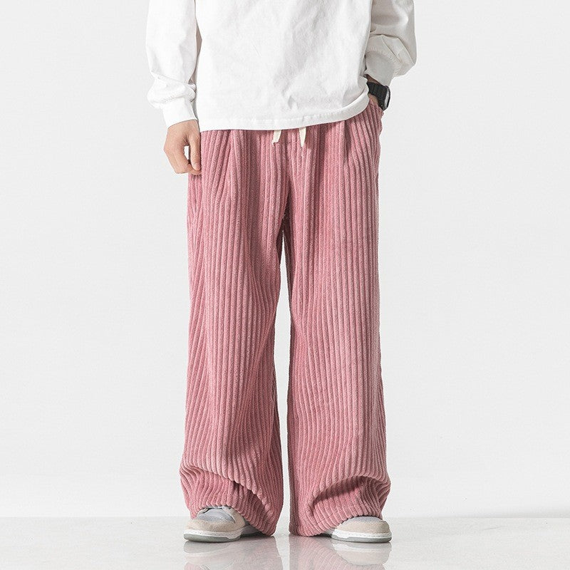 Pink corduroy wide-leg pants with elastic waistband and drawstring, relaxed fit