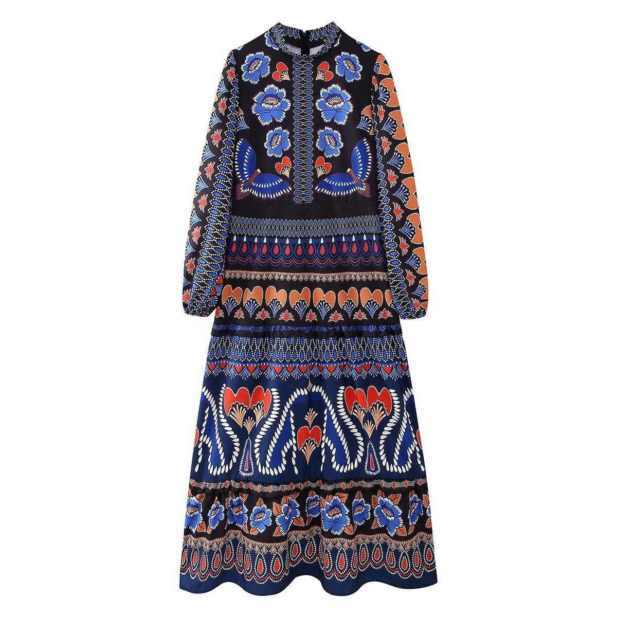 Blue women's long-sleeve tiered midi dress with high neck and colorful folk motifs