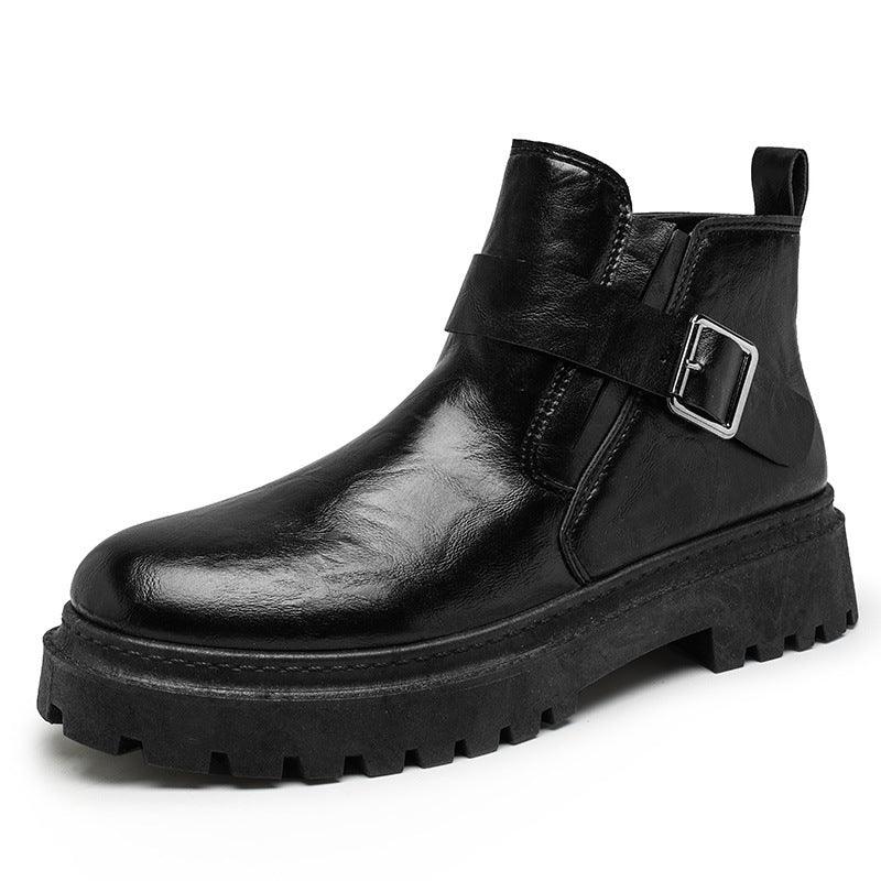 Black Martin ankle boots with side buckle strap and lugged rubber outsole