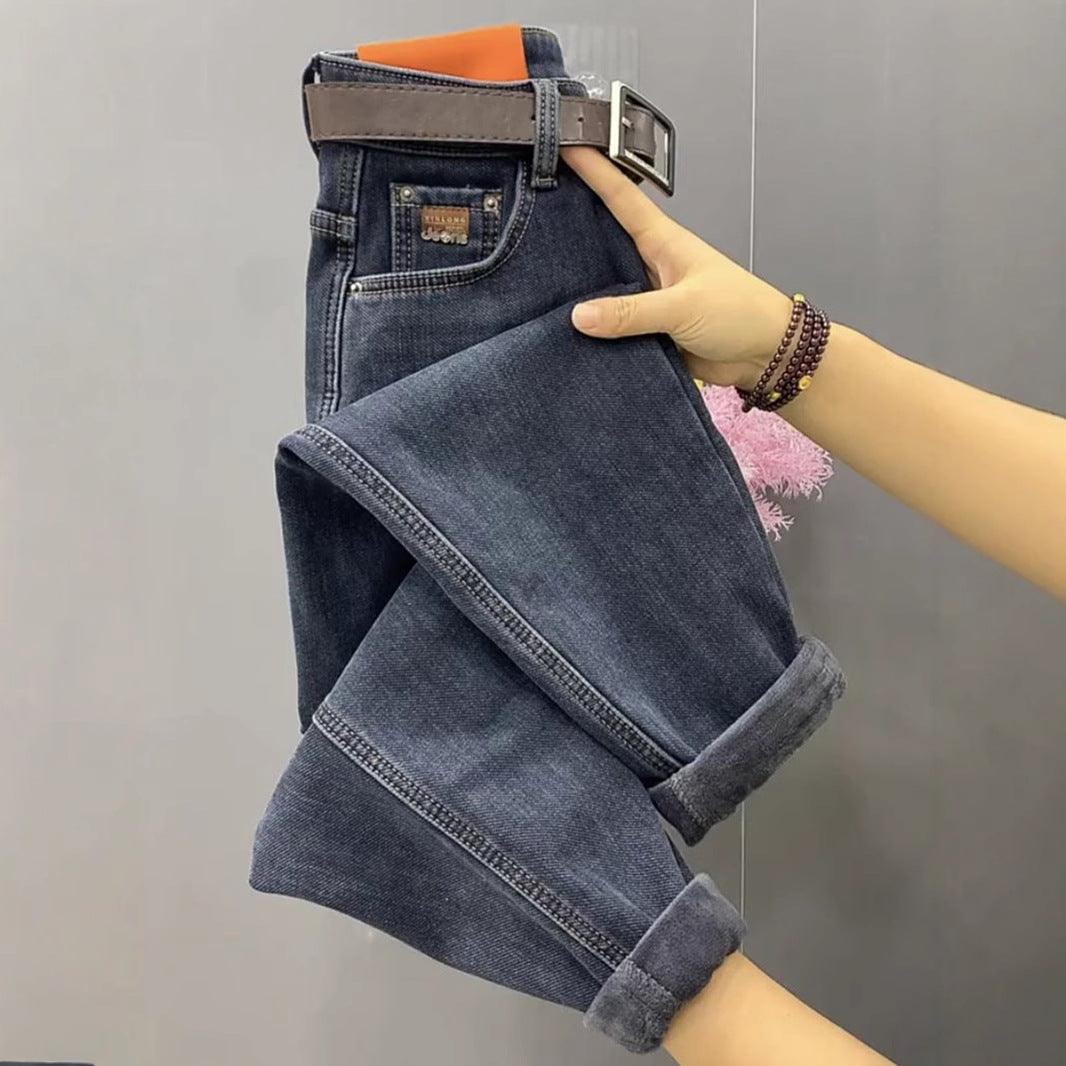 Fleece-lined straight jeans, dark blue denim with button fly and belt loops.