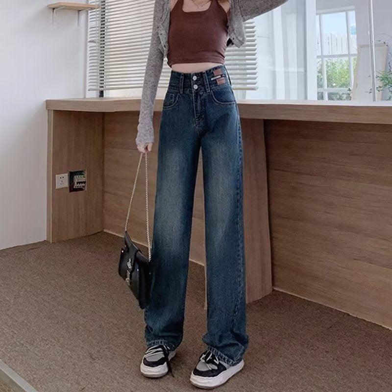 Women's retro high-waist wide-leg jeans, dark blue wash, button fly, belt loops.