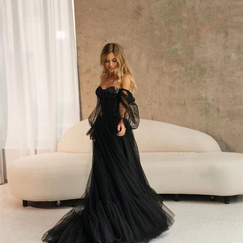 Vestido de novia negro de encaje transparente y manga larga