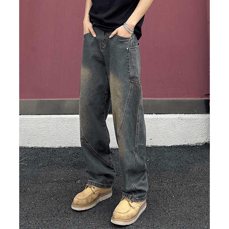 Men's wide-leg denim jeans in gray-blue with a patch pocket detail on one leg