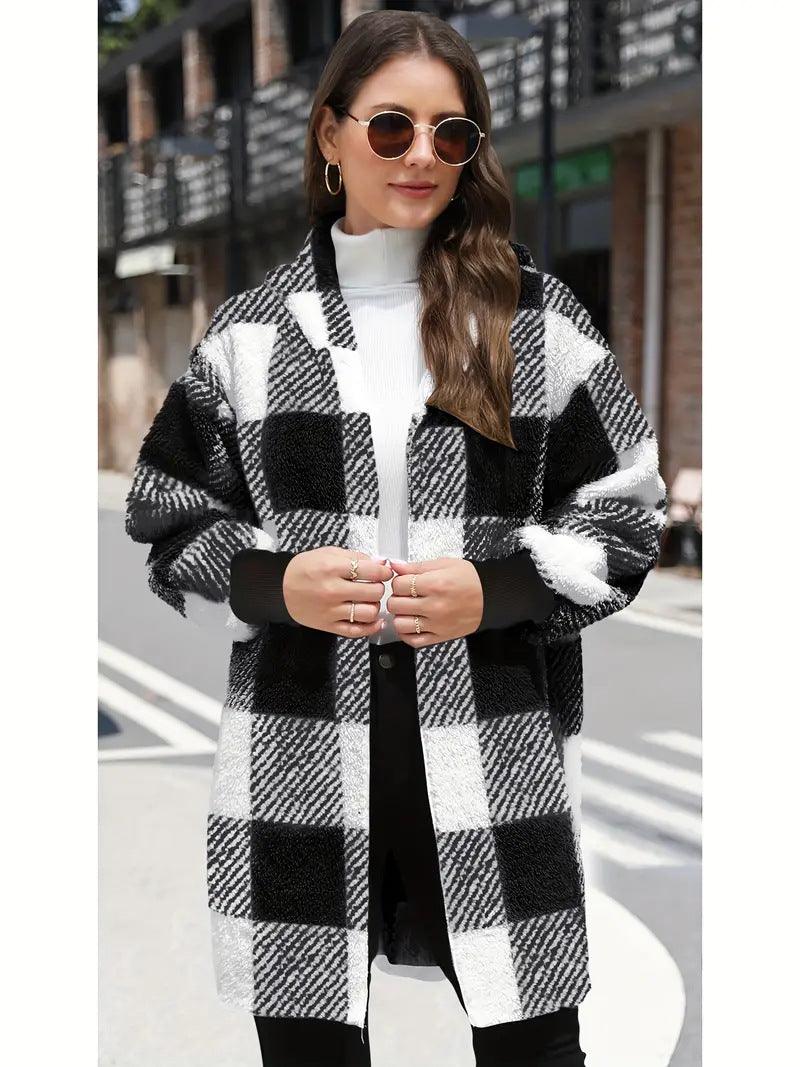 Black and white plaid plush coat with open front and long sleeves