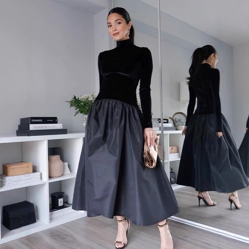 Black long-sleeve dress with velvet high neck bodice and gathered midi skirt
