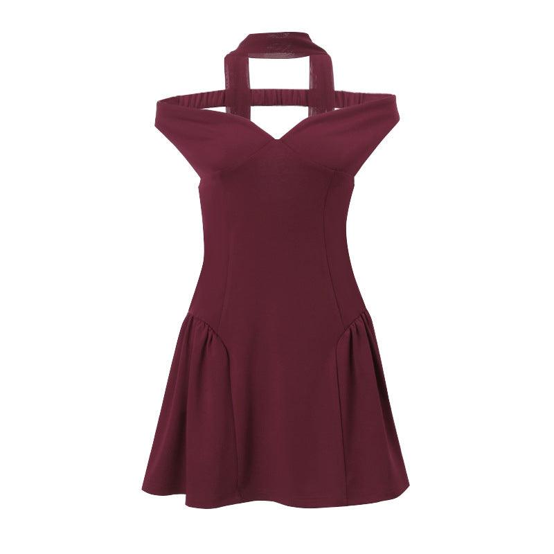 Burgundy mini dress flat lay: fitted bodice and flared skirt with backless halter neckline