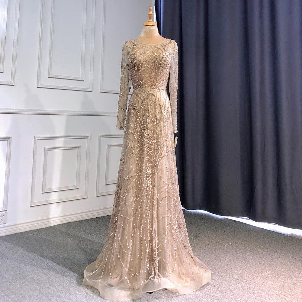 Caramel sequin evening dress with long sleeves, fitted bodice and mermaid hem