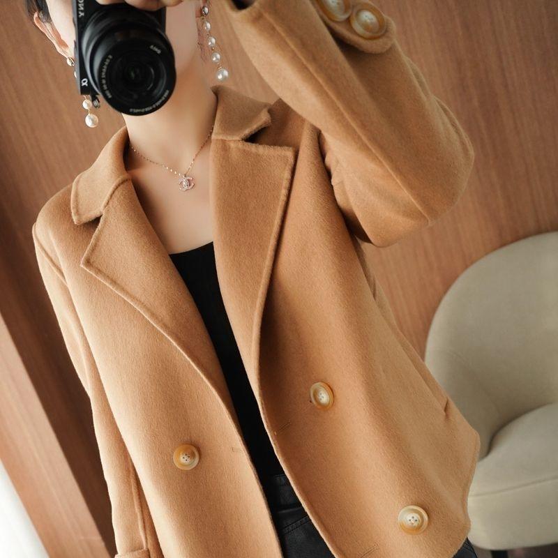 Women’s short coat suit in camel tan, long sleeves with button cuffs and gold buttons