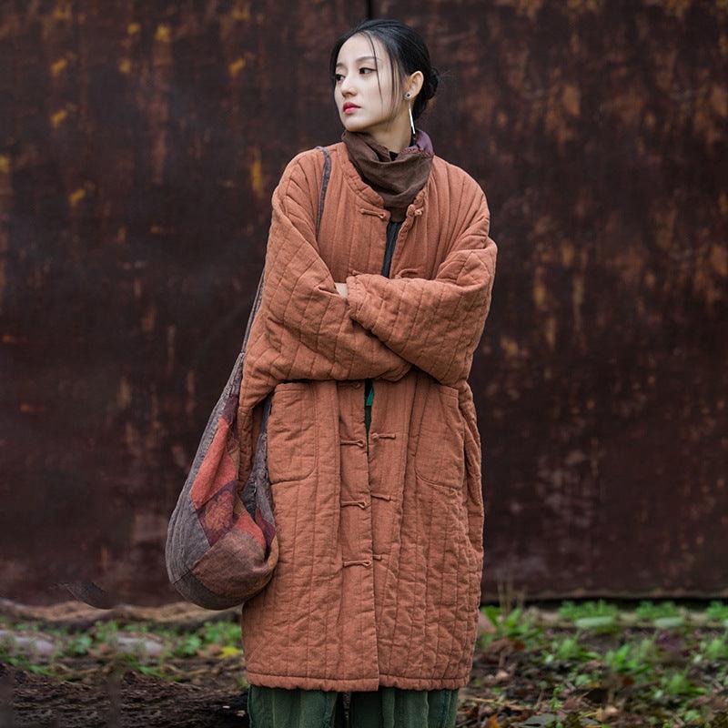 Women's quilted robe with hood, button front, patch pockets, old brick red; tote bag.