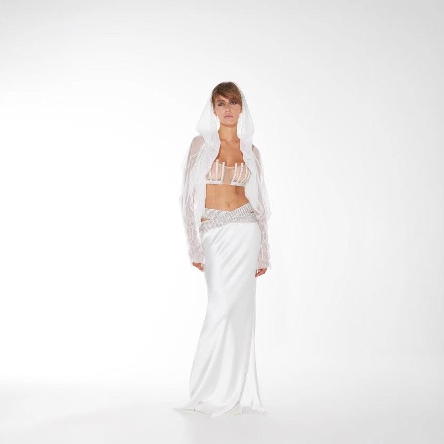 White long evening dress with diamond-embellished bustier and draped veil overlay
