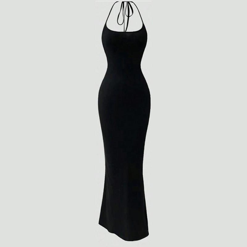Black slim-fit midi dress with exposed back and thin spaghetti straps