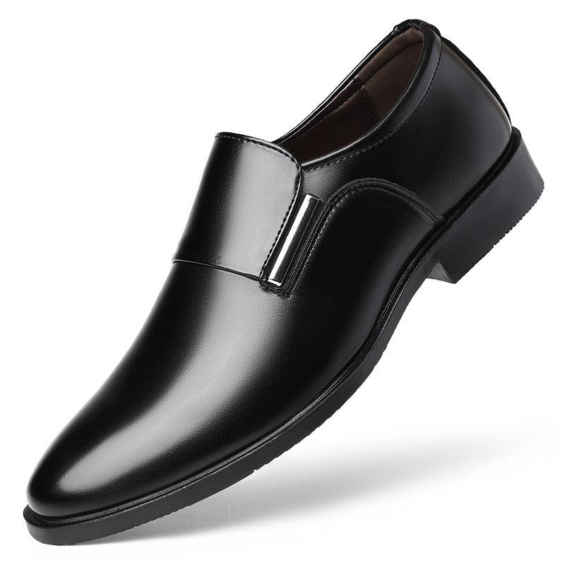 Black leather slip-on dress shoe with side strap detail and low block heel.