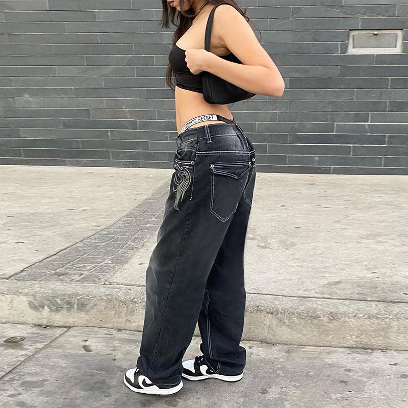 Black high-waist straight denim pants with back pockets and washed finish