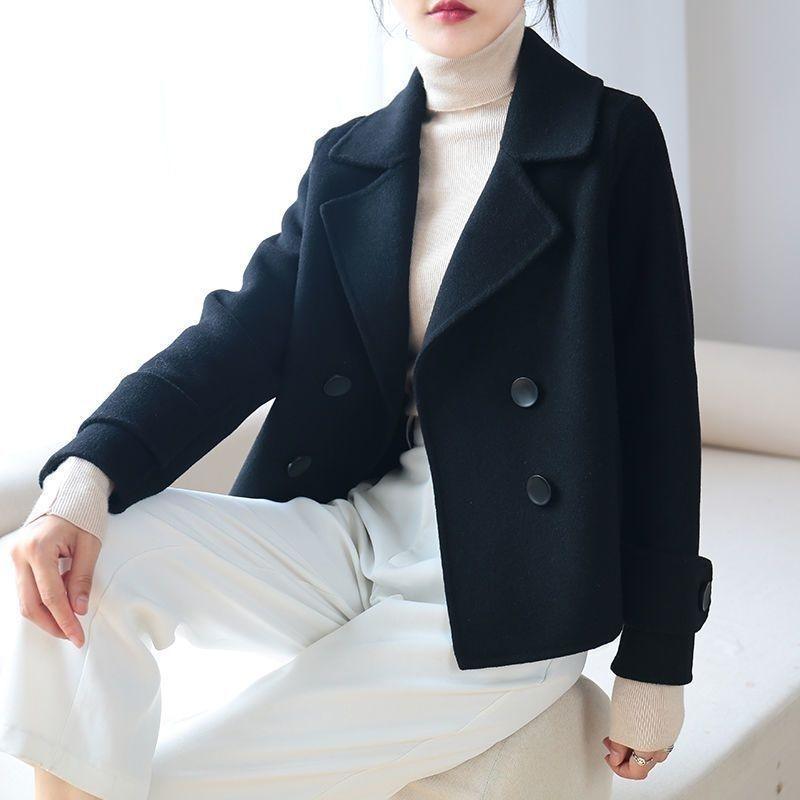 Women’s short coat suit in dark navy/black, double-breasted look with round buttons