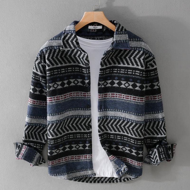 Blue and black patterned loose-fit long-sleeve shirt with collared front.