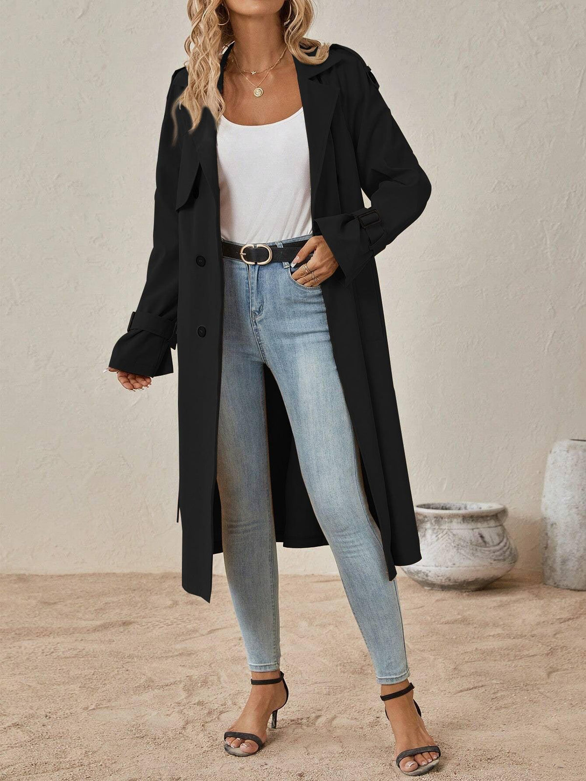 Women's black belted trench coat with lapel collar, double-breasted buttons