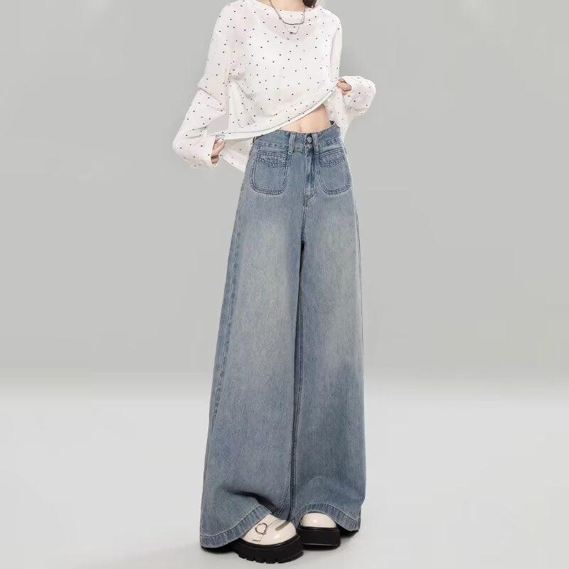 Light blue wide-leg jeans with front patch pockets and button fly