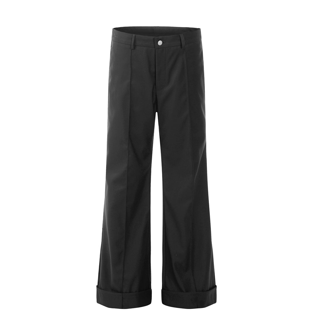 Men's solid black suit pants with loose fit and slightly flared wide legs, button waist