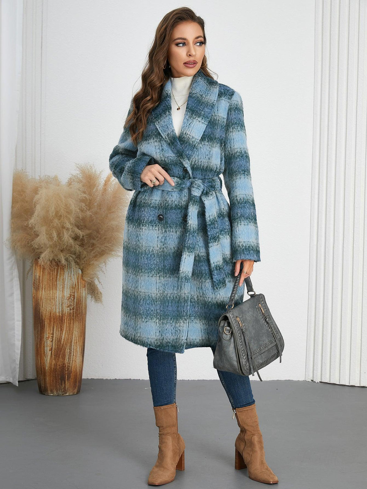 Blue plaid long belted double-breasted coat with notched lapels and button detailing