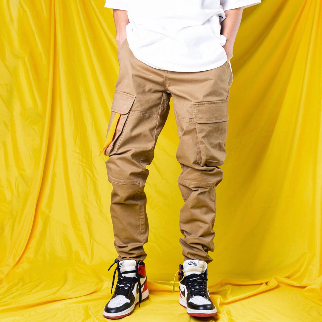 Men’s khaki cargo overalls, jogger-style cuffs, multiple utility pockets
