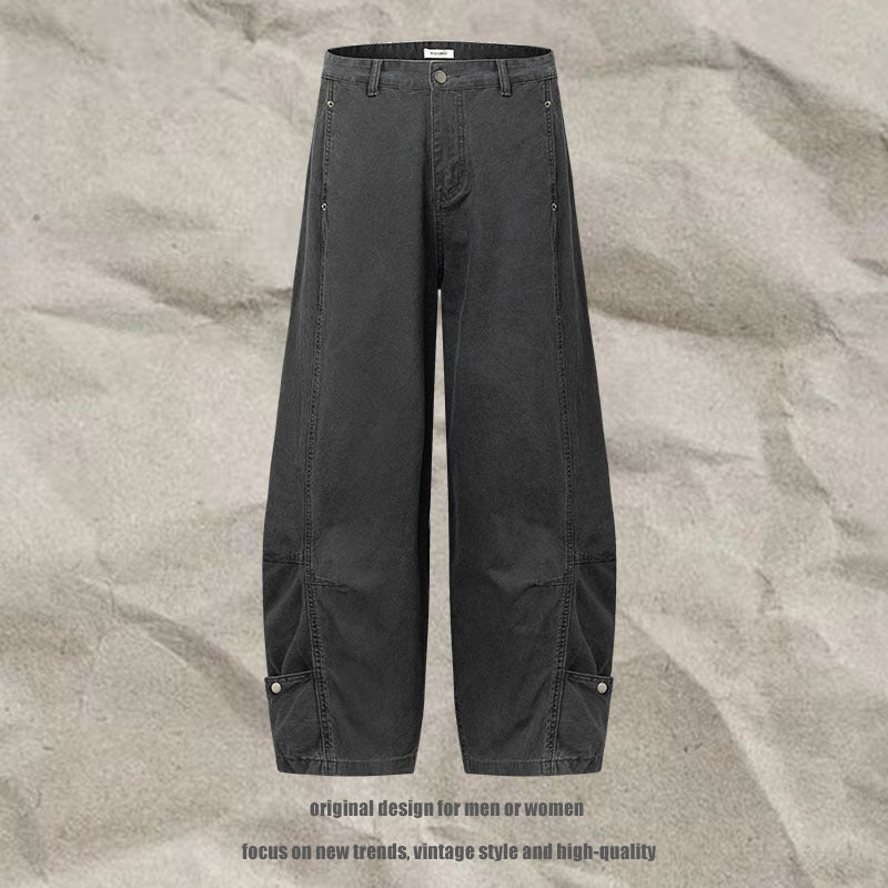 Dark gray wide-leg overalls with front pockets and adjustable waistband tabs