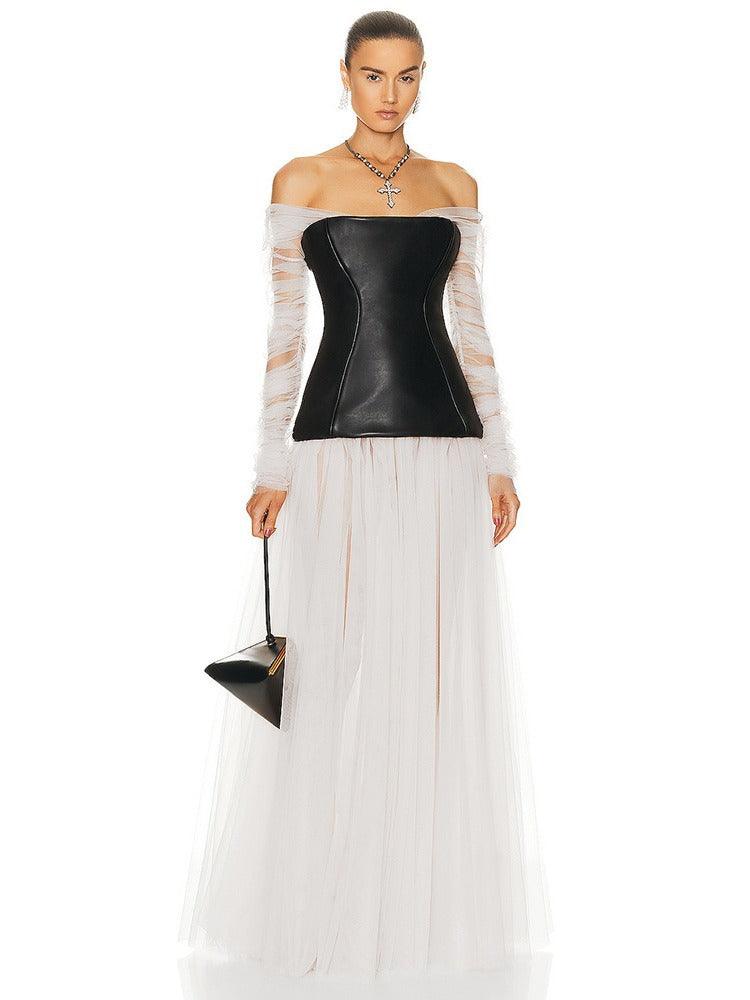 Front view: black cinched PU corset with off-shoulder neckline and white tulle maxi skirt