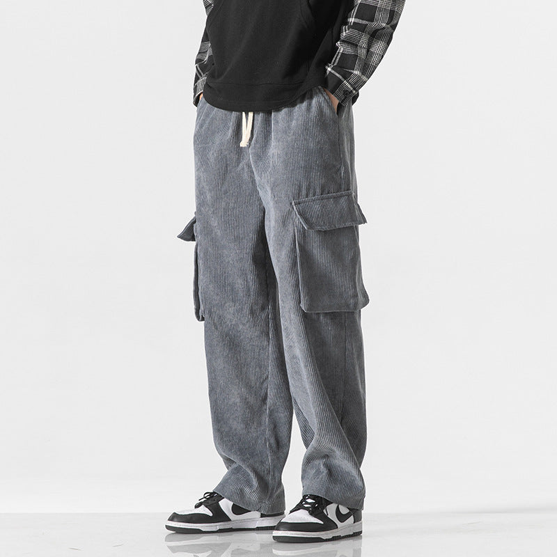 Men's gray corduroy cargo trousers with side pockets and adjustable drawstring hem
