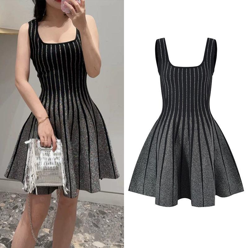 Shiny knitted dress with vertical stripes, scoop neckline, and pleated A-line skirt