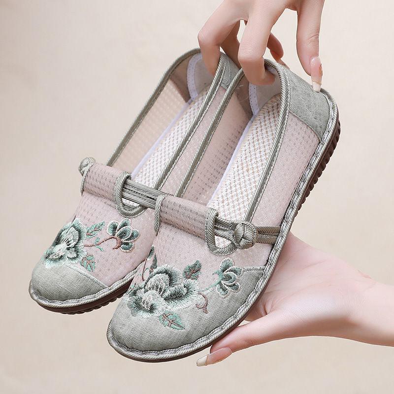 Gray embroidered slip-on shoes with ribbon laces and cushioned lining