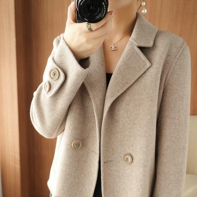 Women’s short coat suit in light camel, buttoned front with structured lapels