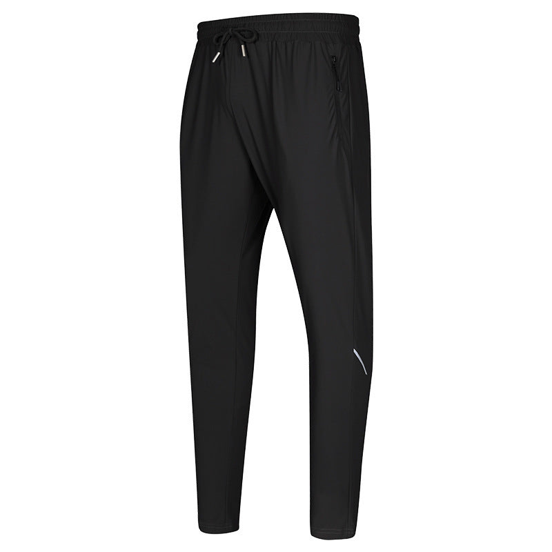 Black exercise workout pants, tapered leg with elastic drawstring waist and zip pockets