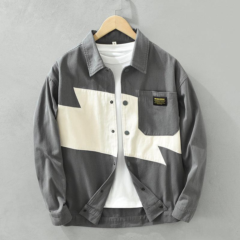 Gray button-up shirt with cream geometric patchwork panels and chest pocket