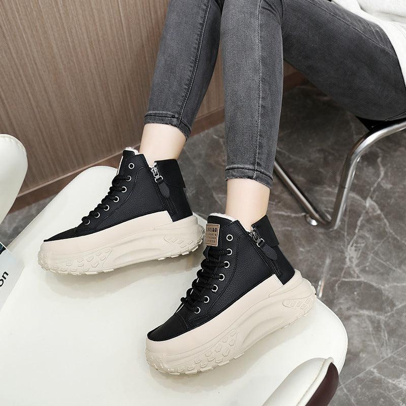 Black high-top sneakers with lace-up front, chunky sole and faux-fur lined collar