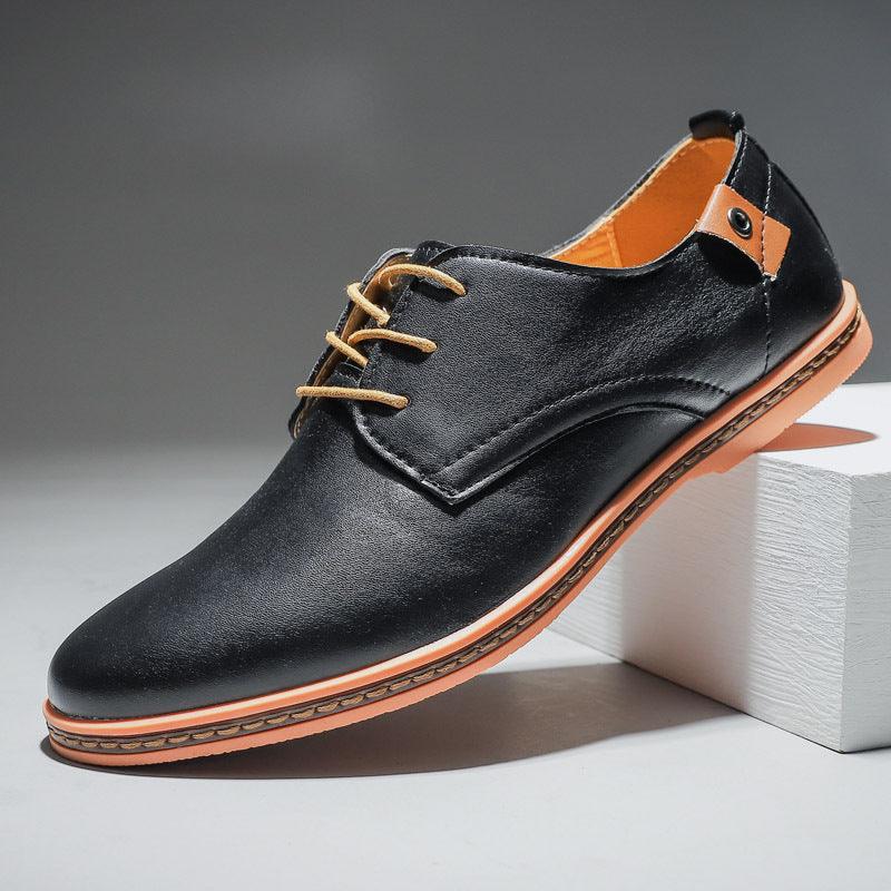 Men's lace-up casual oxford shoes, black leather-look uppers with tan stitching
