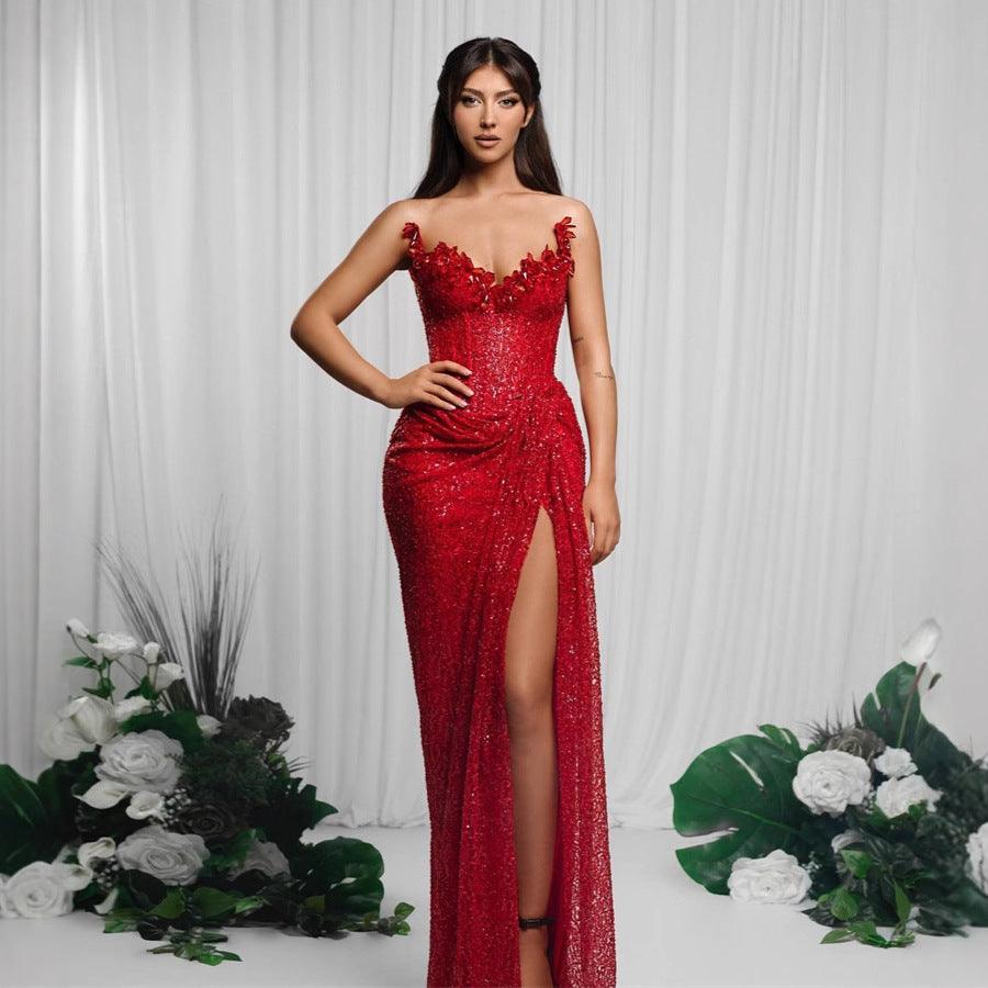 Red sequin tube dress with low-cut neckline and high front slit
