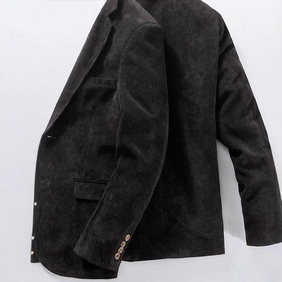 Men’s dark corduroy suit jacket with notch lapel, button cuffs, and flap patch pockets